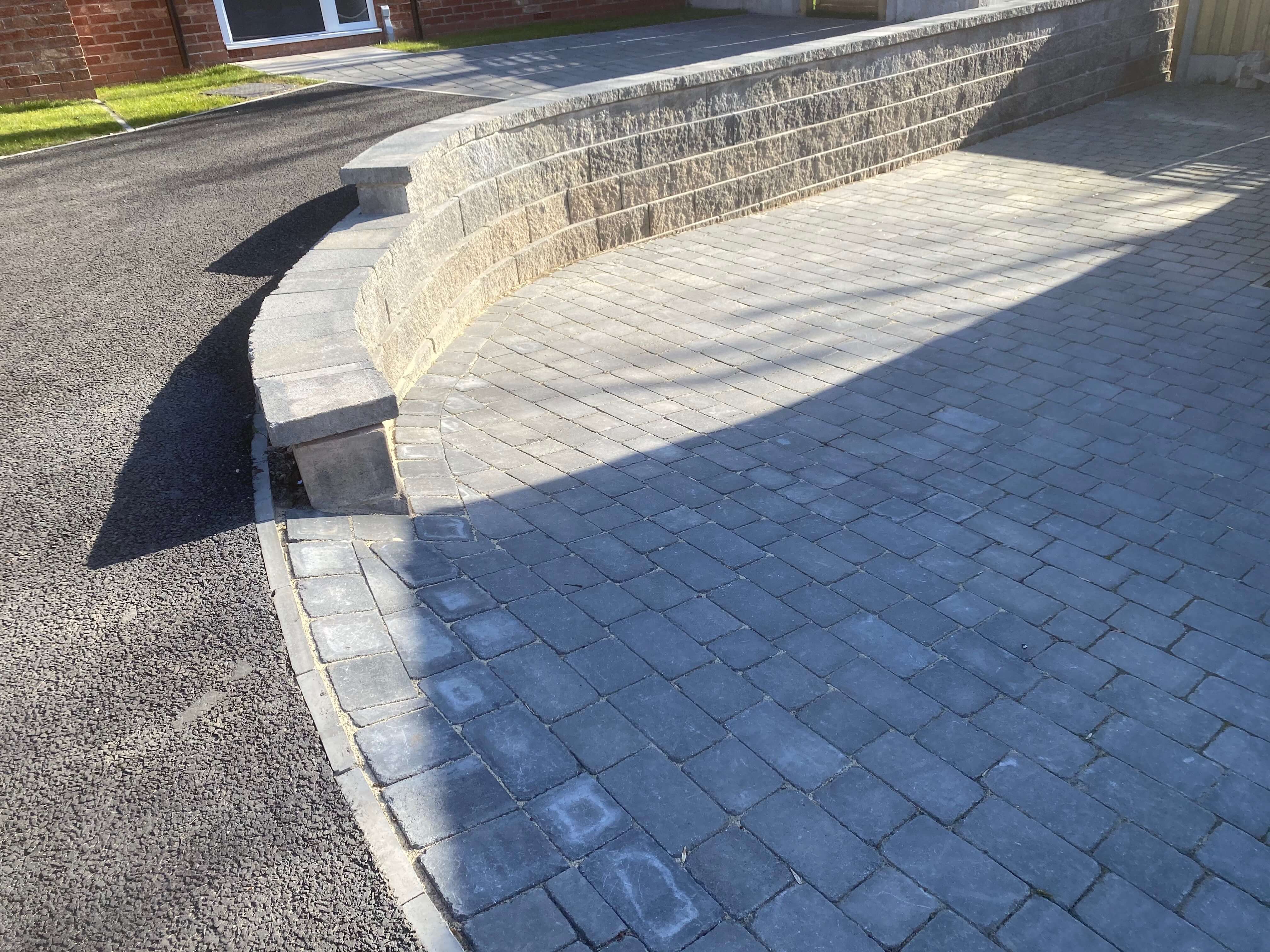 Block paving and hard surfacing for driveways and commercial areas.